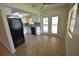 Kitchen with breakfast nook and view of backyard at 619 Glenoak N St, St Petersburg, FL 33703