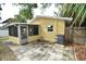 Back patio with screened enclosure and space for relaxing at 619 Glenoak N St, St Petersburg, FL 33703