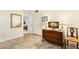 Bedroom with dresser, chair, and mirror at 7 Elgin Pl # 208, Dunedin, FL 34698