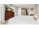 Main bedroom with en-suite bathroom access at 7 Elgin Pl # 208, Dunedin, FL 34698