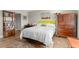 Guest bedroom with built-in shelving and dresser at 7 Elgin Pl # 208, Dunedin, FL 34698