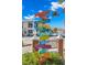 Multi-directional signpost showing local shops and restaurants at 7 Elgin Pl # 208, Dunedin, FL 34698