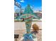 Large, colorful dolphin statue with 'You Are Here' map at 7 Elgin Pl # 208, Dunedin, FL 34698