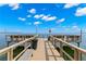 Wooden fishing pier extending over the water at 7 Elgin Pl # 208, Dunedin, FL 34698