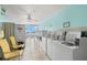 Shared laundry room with multiple washers and dryers at 7 Elgin Pl # 208, Dunedin, FL 34698