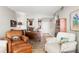 Open living room with a view into the kitchen at 7 Elgin Pl # 208, Dunedin, FL 34698