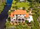 Waterfront home featuring expansive decks and balconies at 8731 Betty St, Port Richey, FL 34668