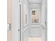 Modern elevator with mirrored walls and sleek design at 8731 Betty St, Port Richey, FL 34668