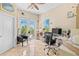 Bright home office with balcony access and workspace at 8731 Betty St, Port Richey, FL 34668