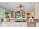 Eat-in kitchen with granite countertops and stainless steel appliances at 8731 Betty St, Port Richey, FL 34668