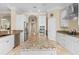 Large kitchen with granite countertops and stainless steel appliances at 8731 Betty St, Port Richey, FL 34668