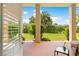 Private patio with lush landscaping and serene views at 8731 Betty St, Port Richey, FL 34668