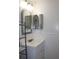 Bathroom with vanity, medicine cabinet, and stylish mirror at 9705 45Th N Way, Pinellas Park, FL 33782