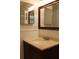 Bathroom with vanity and large mirror at 9705 45Th N Way, Pinellas Park, FL 33782