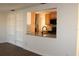 Bright dining area with hardwood floors and kitchen passthrough at 9705 45Th N Way, Pinellas Park, FL 33782