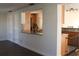 Bright dining area with hardwood floors and kitchen passthrough at 9705 45Th N Way, Pinellas Park, FL 33782