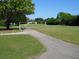 Landscaped golf course pathway at 9705 45Th N Way, Pinellas Park, FL 33782