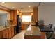 Updated kitchen with granite countertops, modern appliances, and wood cabinets at 9705 45Th N Way, Pinellas Park, FL 33782