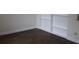 Living room with hardwood floors and built-in shelving at 9705 45Th N Way, Pinellas Park, FL 33782
