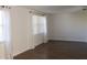 Spacious living room with hardwood floors and large windows at 9705 45Th N Way, Pinellas Park, FL 33782