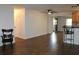 Bright living room with hardwood floors and access to kitchen at 9705 45Th N Way, Pinellas Park, FL 33782