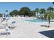 Community pool with patio furniture at 9705 45Th N Way, Pinellas Park, FL 33782