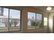 Sunroom with multiple windows and backyard views at 9705 45Th N Way, Pinellas Park, FL 33782