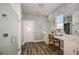 Elegant bathroom with double vanity, large shower, and modern fixtures at 10237 Fieldstone Myrtle Way, San Antonio, FL 33576