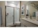 Modern bathroom with a walk-in shower and stylish fixtures at 10237 Fieldstone Myrtle Way, San Antonio, FL 33576