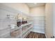 Walk-in pantry with wire shelving, offering ample storage at 10237 Fieldstone Myrtle Way, San Antonio, FL 33576