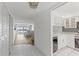 Bright condo entryway with view of living room and kitchen at 105 Island Way # 146, Clearwater, FL 33767