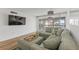 Living room with water views and sectional sofa at 105 Island Way # 146, Clearwater, FL 33767