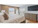 Spacious main bedroom with water views and ample closet space at 105 Island Way # 146, Clearwater, FL 33767