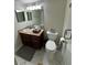 Bathroom with granite countertop and dual sinks at 1270 Gulf Blvd # 1206, Clearwater Beach, FL 33767