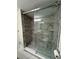 Bathroom featuring a walk-in shower with modern tile at 1270 Gulf Blvd # 1206, Clearwater Beach, FL 33767
