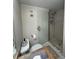 Bathroom with a walk-in shower and toilet at 1270 Gulf Blvd # 1206, Clearwater Beach, FL 33767