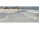 Waves rolling onto sandy beach near condos at 1270 Gulf Blvd # 1206, Clearwater Beach, FL 33767