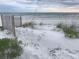 Relaxing beach access with white sand and dunes at 1270 Gulf Blvd # 1206, Clearwater Beach, FL 33767