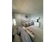 Bedroom with two beds, nautical decor, and closet at 1270 Gulf Blvd # 1206, Clearwater Beach, FL 33767