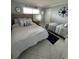 Bedroom with two beds and nautical decor at 1270 Gulf Blvd # 1206, Clearwater Beach, FL 33767