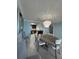 Open dining area with kitchen access and chandelier at 1270 Gulf Blvd # 1206, Clearwater Beach, FL 33767