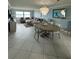 Elegant dining room with large table and ocean view at 1270 Gulf Blvd # 1206, Clearwater Beach, FL 33767