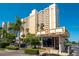 Harbour Light Towers condo building with gated entrance and parking at 1270 Gulf Blvd # 1206, Clearwater Beach, FL 33767