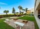 Enjoy cornhole on the beautifully landscaped lawn at 1270 Gulf Blvd # 1206, Clearwater Beach, FL 33767