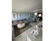 Open concept living room, dining, and kitchen area at 1270 Gulf Blvd # 1206, Clearwater Beach, FL 33767
