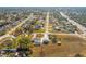 Aerial view showing home, pool, detached workshop, and neighborhood context at 13101 Delbarton St, Spring Hill, FL 34609
