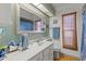 Clean bathroom with single sink vanity and shower/tub combo at 13101 Delbarton St, Spring Hill, FL 34609