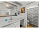 Bathroom with single vanity and shower at 13101 Delbarton St, Spring Hill, FL 34609