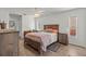 Bedroom with wooden bed frame and nightstands at 13101 Delbarton St, Spring Hill, FL 34609