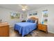 Bedroom with wood furniture and ceiling fan at 13101 Delbarton St, Spring Hill, FL 34609